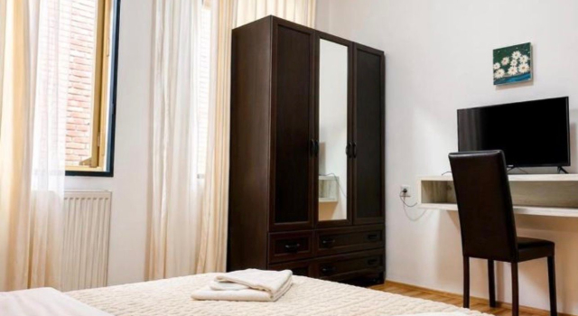Camera quadrupla Deluxe 2 camere con balcone Vern Hotel