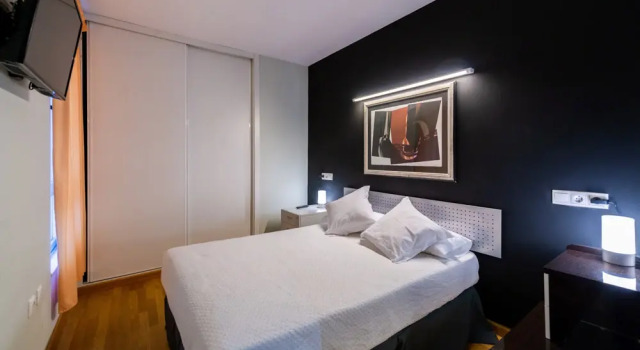 Апартаменты с 2 комнатами с балконом и с видом на город Apartamentos León