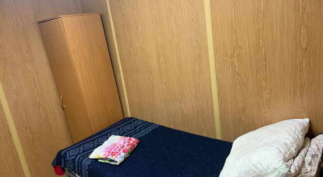 Кровать в общем номере Гостиница Нева