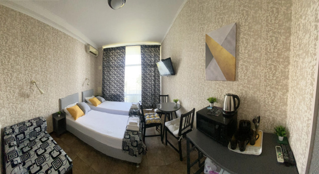 Трёхместный номер Standard с балконом и с видом на море Отель Joy Apartments