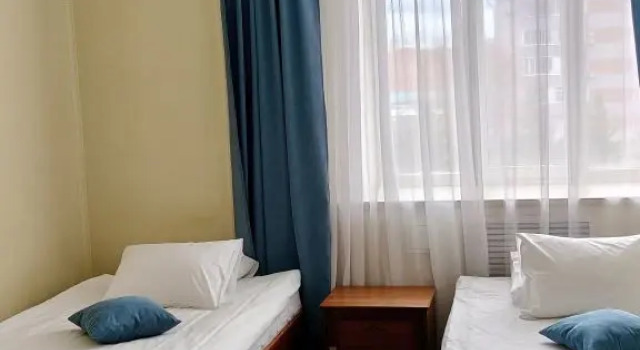 Четырёхместный номер Двухкомнатный Отель Азалия на Нариманова