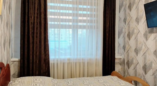 Na Molodyozhnoy 25 Flat, Rezerwuj Apartament Hotele w Republika Komi z parkingiem, Parking