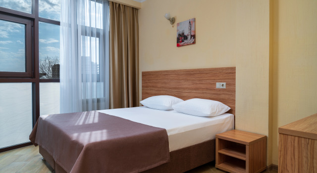 Четырёхместный номер Семейный Отель RoomHotel