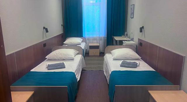 Кровать в общем номере Отель Smart Hotel Тында