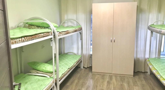Кровать в общем номере Хостел Ромашка