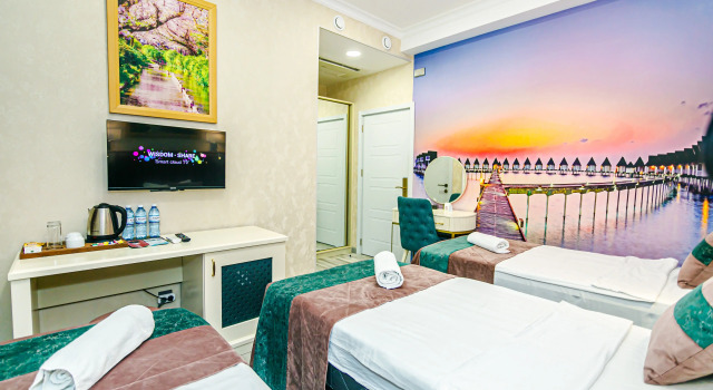 Трёхместный номер Standard Essam Deluxe Hotel