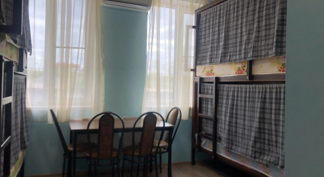 Кровать в общем номере Отель Атаманский двор