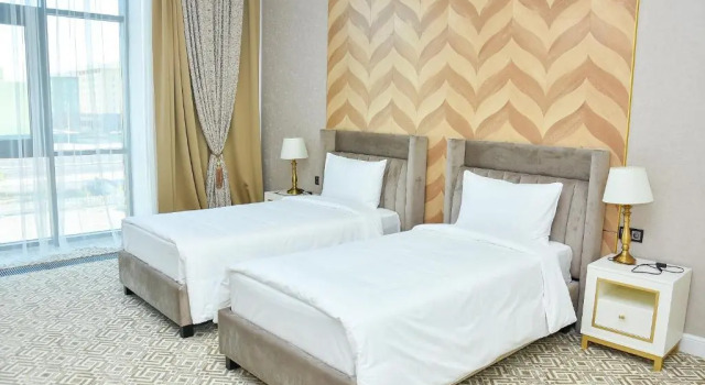 Четырёхместный семейный люкс Отель Ramada by Wyndham Turkistan