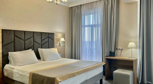 Двухместное джуниор сюит Плюс с красивым видом из окна Отель Derbent Hotel & Spa Premium