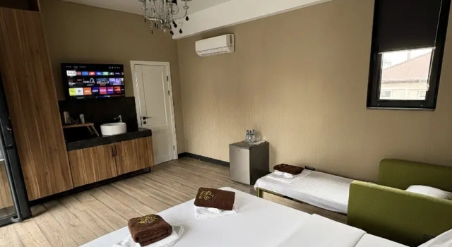 Confort triple chambre avec balcon AINLAN Hotel