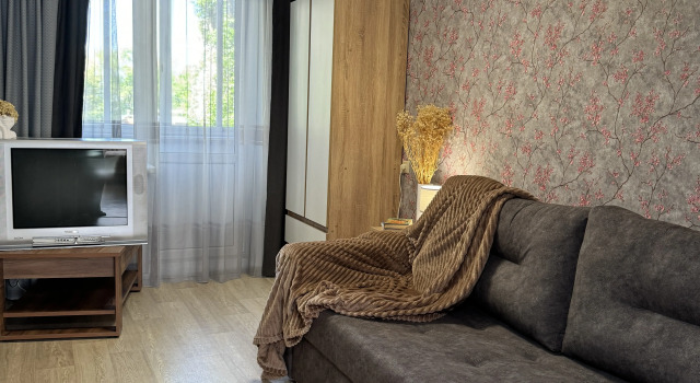 Uyutnaya Tryokhkomnatnaya Flat, Prenota Appartamento Hotel a Central Russia con parcheggio, Parcheggio