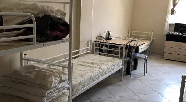 Кровать в общем номере Отель Гостиный Двор