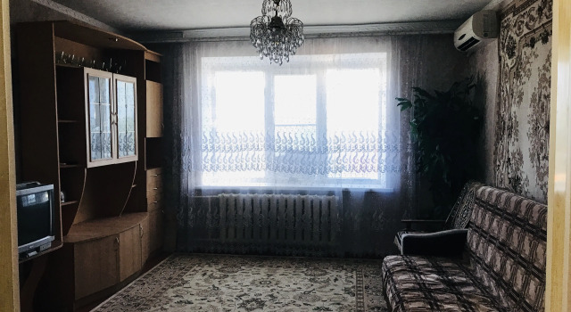 Одноместные апартаменты с балконом Квартира при Въезде в Город