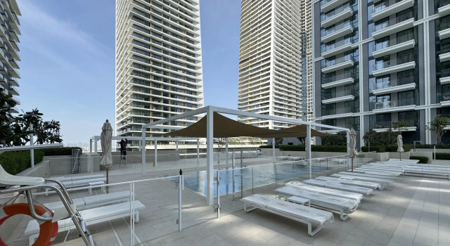 Апартаменты Modern 1BR in Beach Mansion with Pool and Gym
