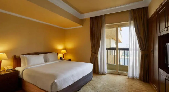 Двухместный номер with side Nile View Guest Plus Отель Hilton Cairo Zamalek Residences