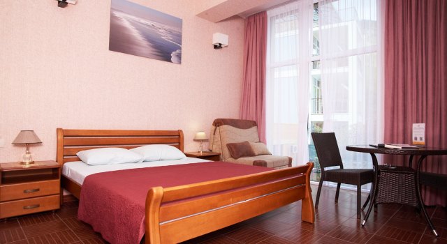 Четырёхместный полулюкс 2-room с балконом и с красивым видом из окна Отель Вилла Аннигора