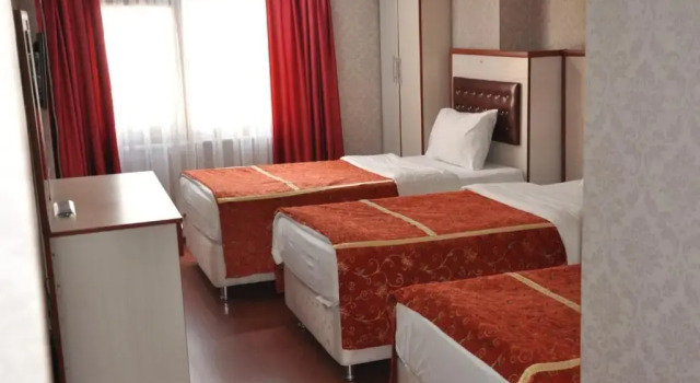 Трёхместный номер Tayhan Hotel