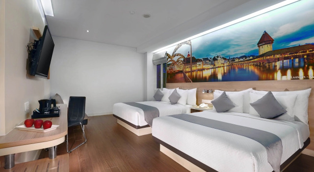 Family Quadruple room Hotel Neo Gubeng by ASTON