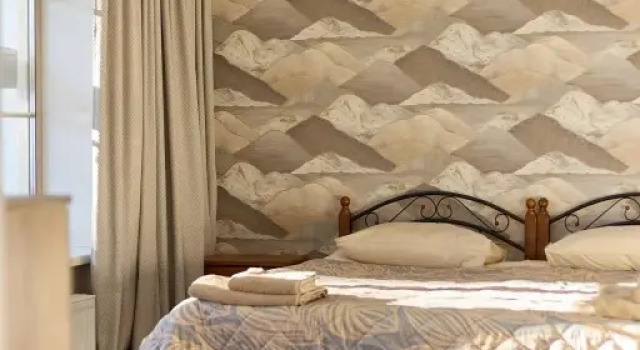 Luxe Vierpersoons Familie kamer uitgang op de binnenplaats Dagar Guest house