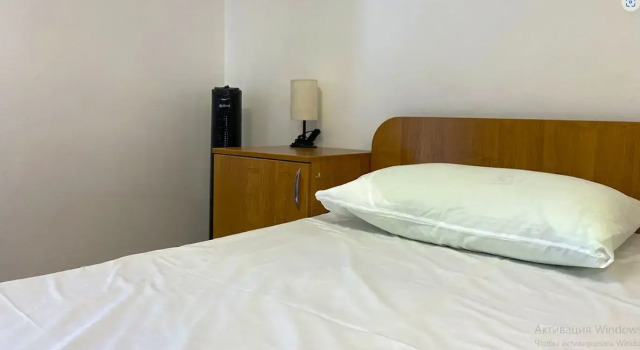 Кровать в общем номере с красивым видом из окна Мини-отель Smart Hotel Петрозаводск