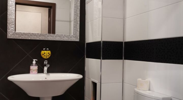 Четырёхместные апартаменты с балконом и с видом на город Kvartira-Studiya Apartaments