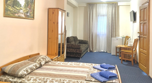 Четырёхместный номер Comfort с 2 комнатами с красивым видом из окна Жилое помещение Сувенир