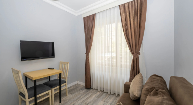 Двухместный номер с диваном Cirrus Suites