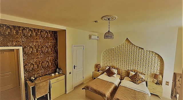 Люкс с диваном семейный с красивым видом из окна Sands of Time Apart Hotel