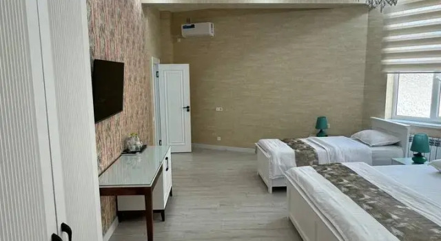 O podwyższonym standardzie rodzinny pokój z widokiem na miasto Izumrud Palace Hotel