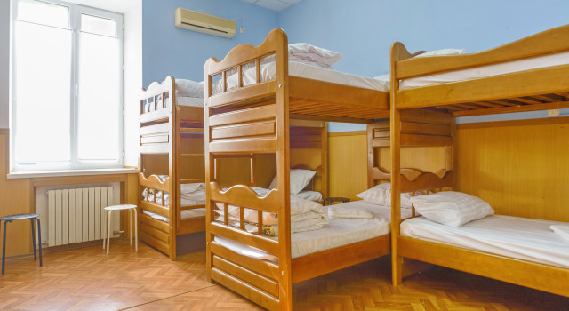 Кровать в общем номере (женский номер) с красивым видом из окна Апартаменты на Дерибасовской