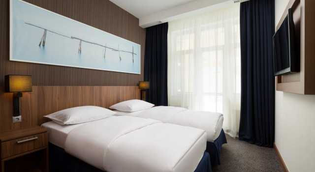 Шестиместные апартаменты с 3 комнатами с балконом Апартаменты Radisson, Завидово