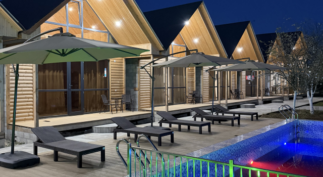 Курортный отель Akhan Resort Gagra - Виллы у реки с видом на горы возле моря