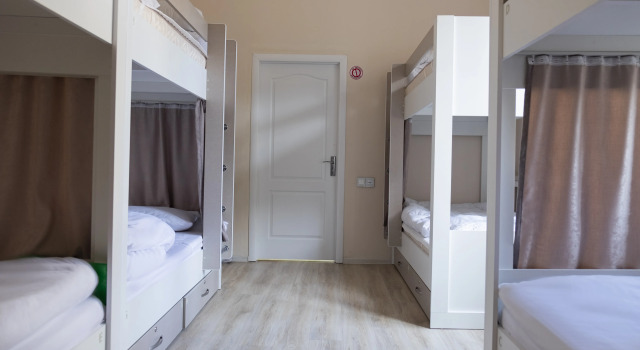 Кровать в общем номере (женский номер) Travel Inn Hostel
