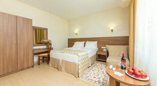 Четырёхместный семейный номер Comfort Отель Villaggio