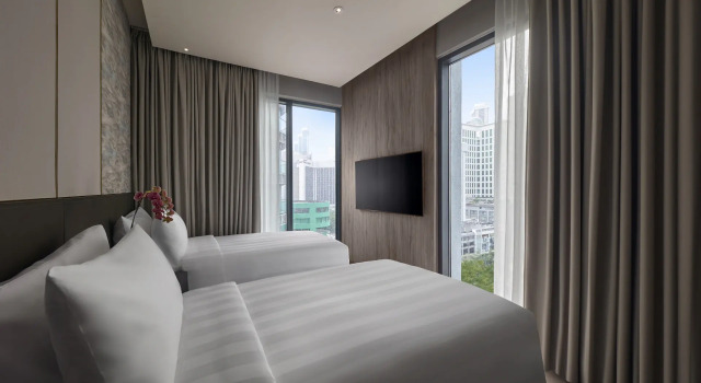 Люкс Deluxe с 2 комнатами с видом на город Pan Pacific Serviced Suites Kuala Lumpur
