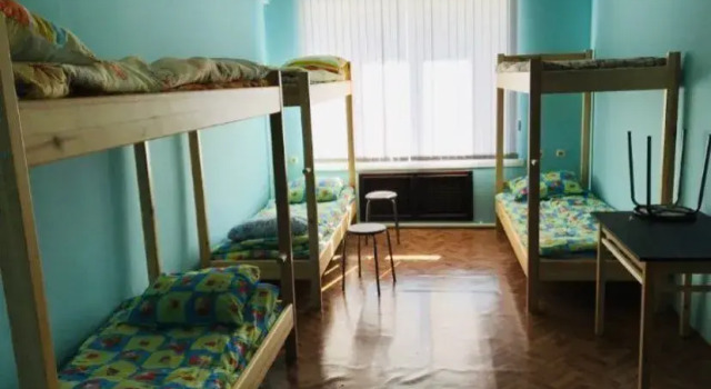 Кровать в общем номере (мужской номер) Гостиница Бархат
