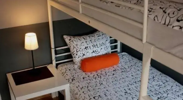Кровать в общем номере Гостевой Дом Anton House