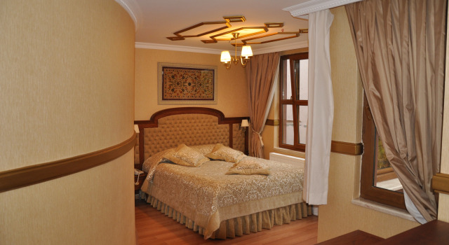 Четырёхместный семейный номер Standard Aruna Boutique Hotel