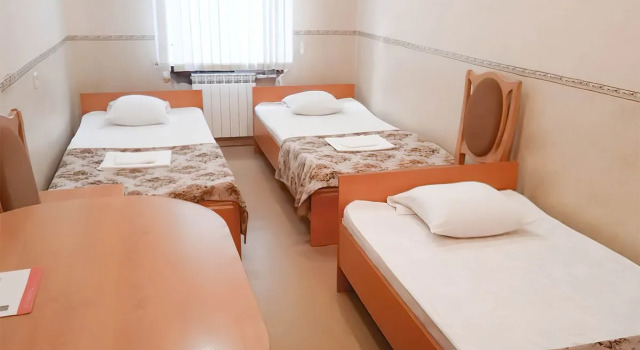Кровать в общем номере с видом на город Мини-отель Smart Hotel Киров