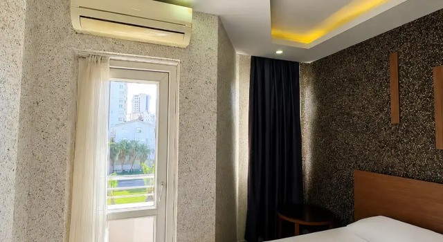 Семейный номер Deluxe с балконом и с видом на сад Luna Hotel