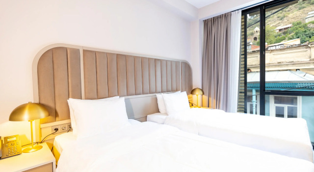 Четырёхместный семейный люкс STROFI Boutique Hotel