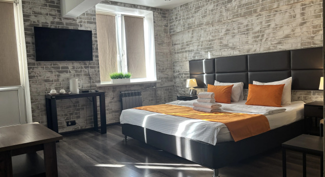 Четырёхместный люкс с видом на город Мини-отель Мини-отель Городской отель Apartments 4