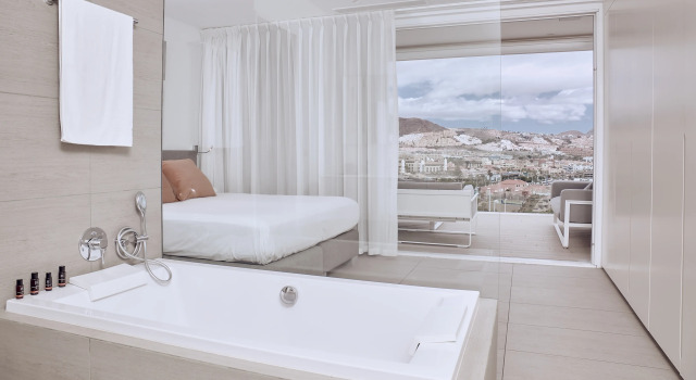 Люкс Serenity Allegra Extra Large Room с 2 комнатами с частичным видом на море Domes Baobab Suites