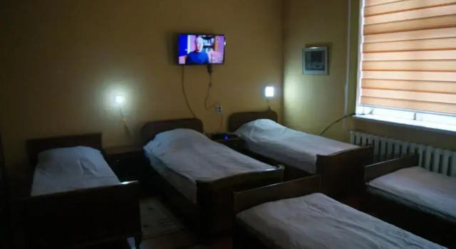 Bett im Wohnheim mit Balkon Гостевой дом