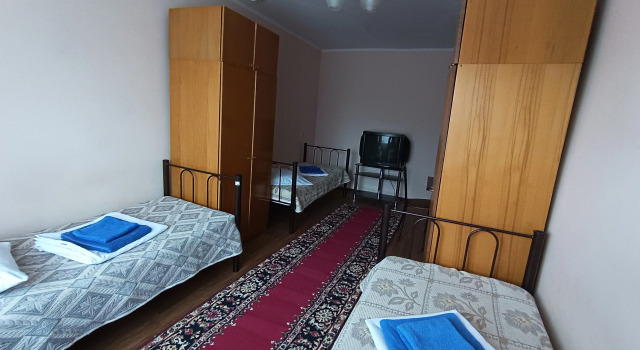 Кровать в общем номере Хостел Гостиница Надежда
