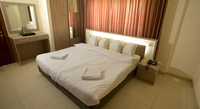 Отель Lujain Suites