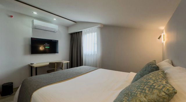 Номер Standard с балконом и с видом на город Отель Leaf River Suites