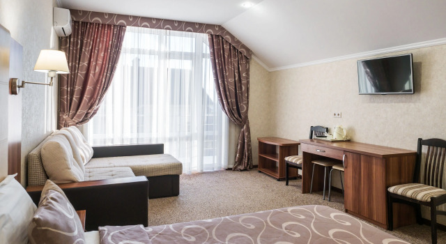 Четырёхместный номер Comfort с балконом Гостевой дом Кассиопея