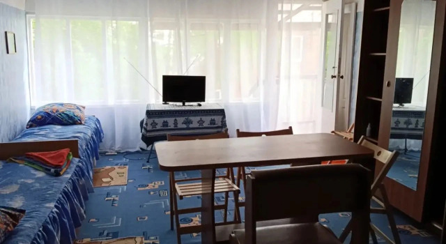 Кровать в общем номере Гостевой дом Чайка