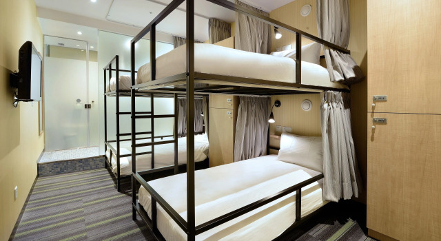 Кровать в общем номере Park City Inn & Hostel